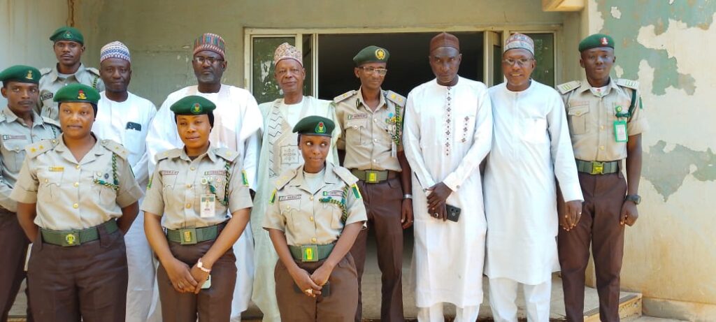 Danchadi in a group photograph with the NCS officials