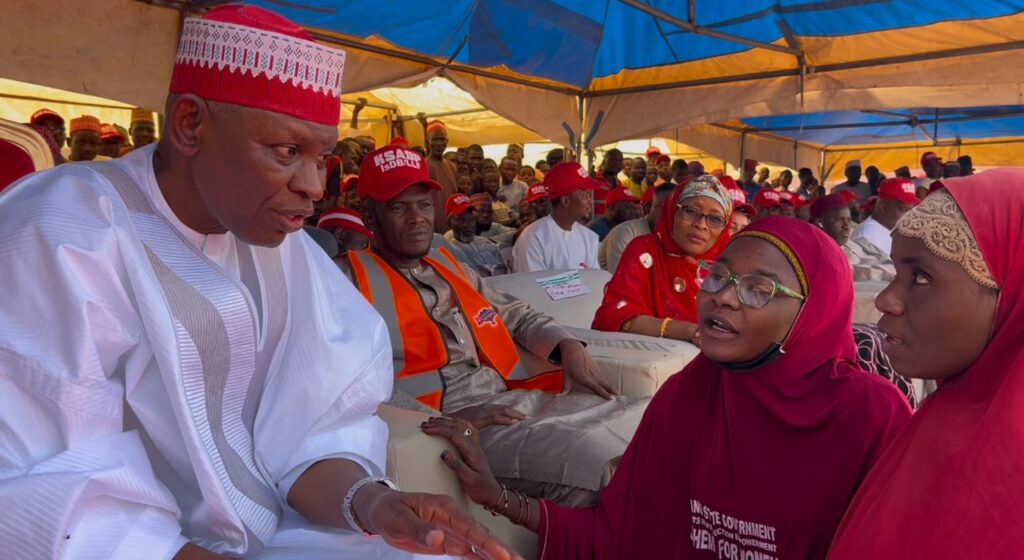 Governor Yusuf with the beneficiary