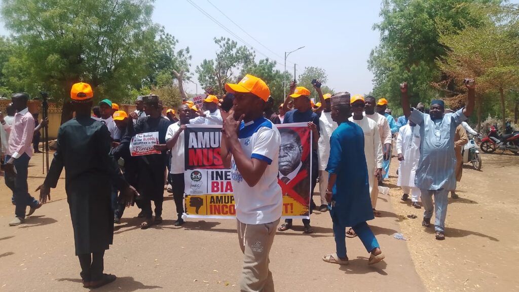 Members of the opposition parties protesting, demands INEC chairman removal