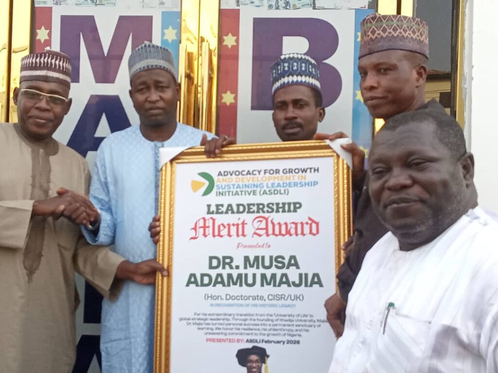 Educational development: Group honours Majia with merit award Presenting the award