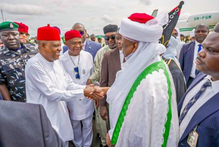 VO Shettima in a handshake with Prof. Saleh Usman